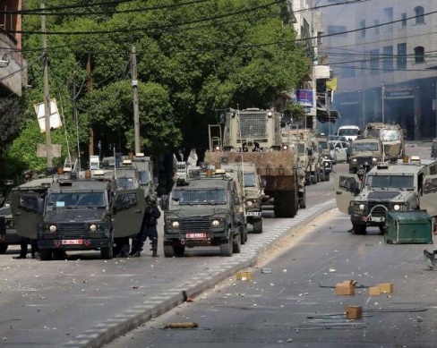 "معاريف": مسؤولون إسرائيليون يدفعون لتفجير الضفة قبيل الانتخابات.. والجيش ينقل قوات من لبنان وغزة