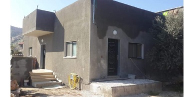قوات الأمن الوطني الفلسطيني تسلم منزلين لمواطنين من بلدة سيريس جنوب جنين