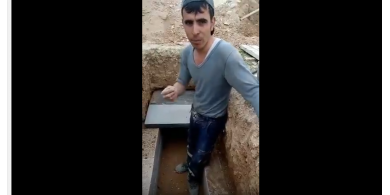 شاهدوا تجربة هذا الشاب بالنوم في القبر!!