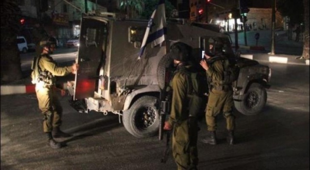 الاحتلال يعتقل 14 فلسطينيا من الضفة والقدس