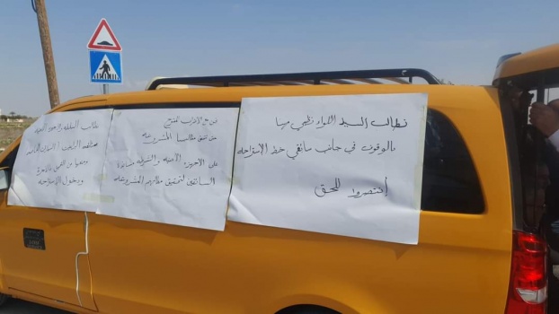 سائقو خط الجسر يعلنون الإضراب المفتوح بدءاً من اليوم (صور)