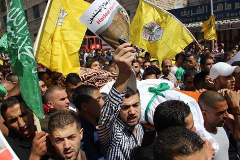 بالصور...آلاف المواطنين يشيعون الشهيدة هديل الهشلمون في الخليل