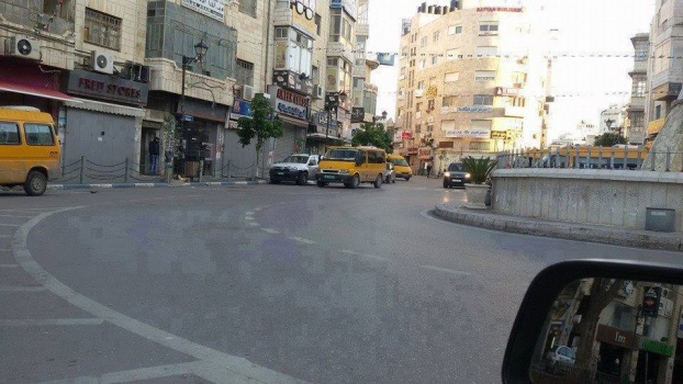 بالصور..اضراب جزئي يعم في رام الله حداداً على روح الشهيدان البرغوثي وحماد