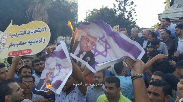 فتـح تستنكر حرق صور الرئيس بغزة على يد انصار دحلان