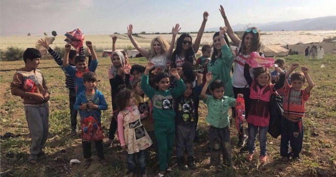 بالصور والفيديو :مجموعة من المتطوعين المغتربين يقدمون مساعدات طبية في الأردن وفلسطين