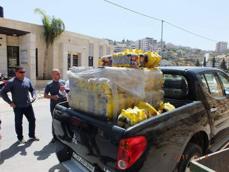 اتلاف مشروبات غازية منتهية الصلاحية في جنين