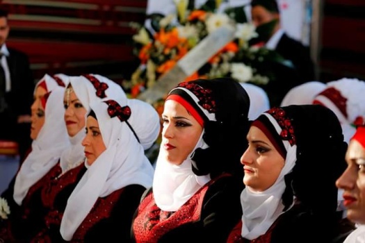 بالصور..محافظة الخليل تحتفل بالعرس الجماعي الاول للاشخاص ذوي الاعاقه بزفاف 80عريس وعروس