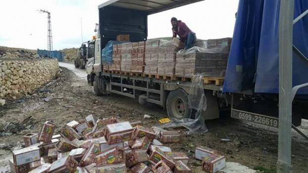 بالصور..وزارة الإقتصاد تتلف 24طن حليب بالشوكولاته منتهي الصلاحية في جنين