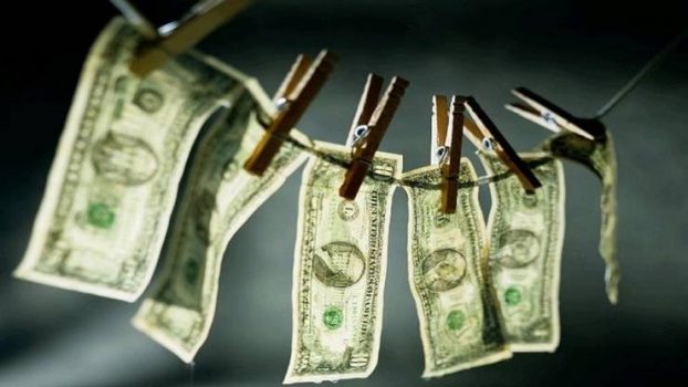 هل ينتقل فيروس كورونا عبر الأوراق النقدية؟